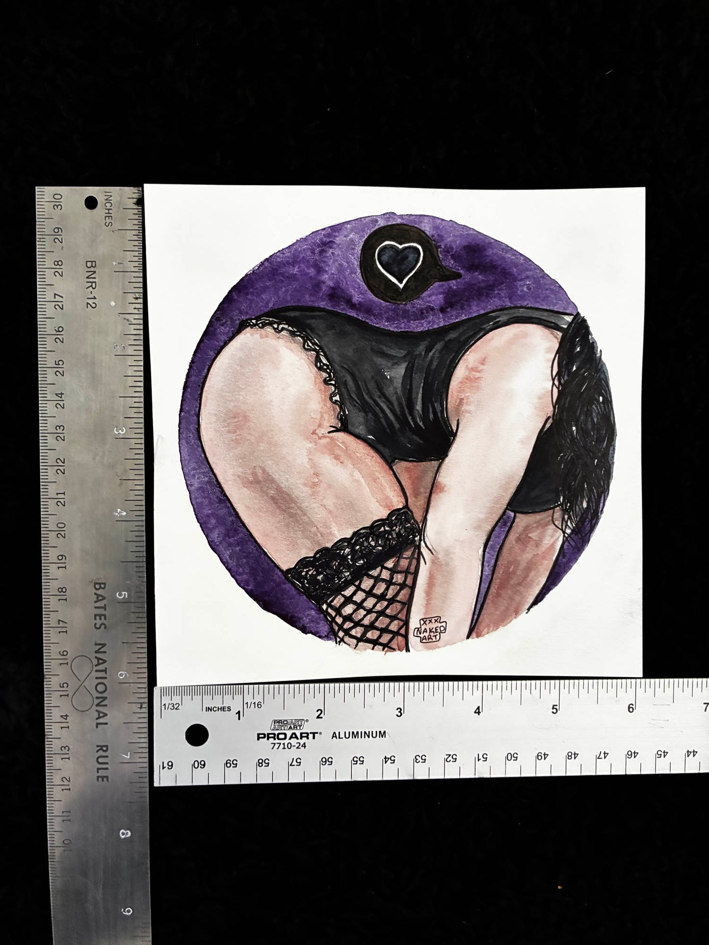 Illustration of a person wearing black lingerie with purple accents, framed by a heart shape, on a white background with rulers for scale.