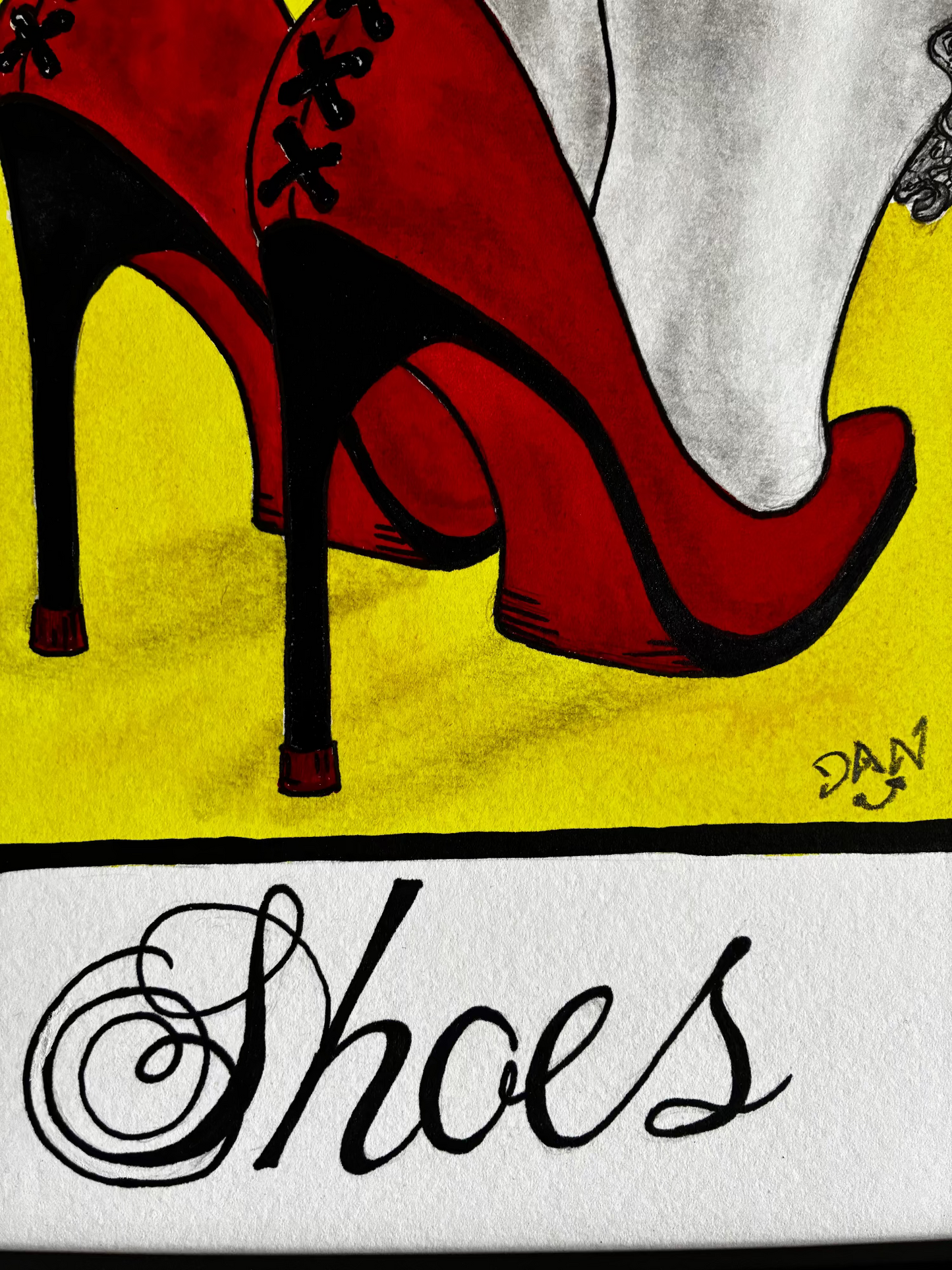 Red high-heeled shoes on a yellow background with 'Shoes' text.