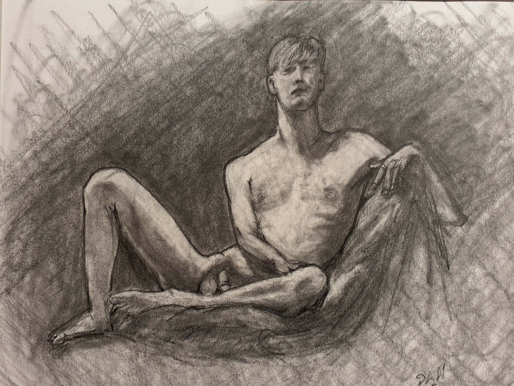 Pencil drawing of a nude figure sitting on the ground.