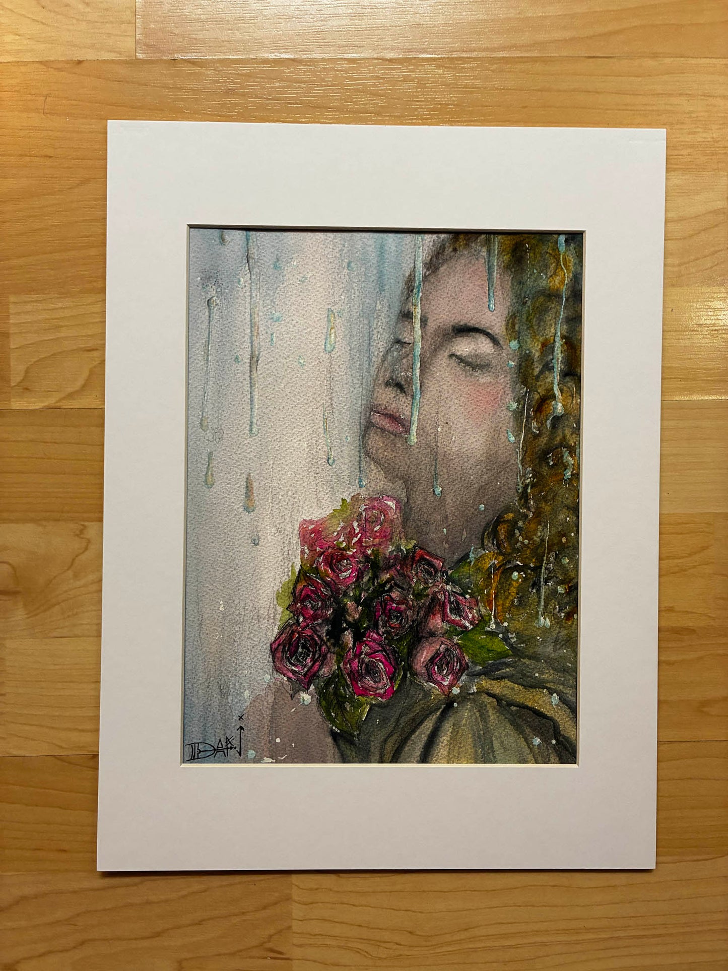 Artistic depiction of a face with flowers on a wooden surface