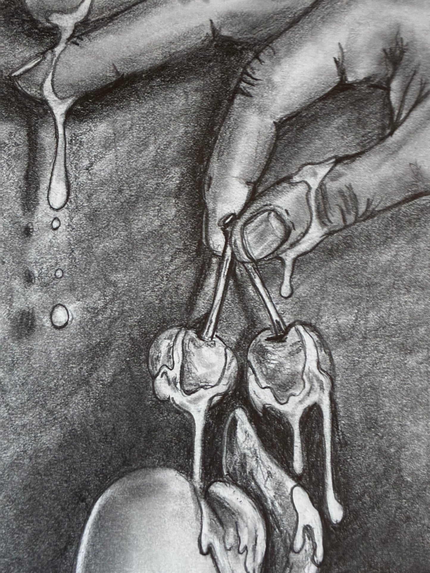 Illustration of a hand holding cherries